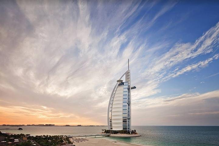 Experience the blend of luxury and tradition in Dubai from the iconic Burj Al Arab to serene desert landscapes culminating in a remarkable iftar after a desert safari.